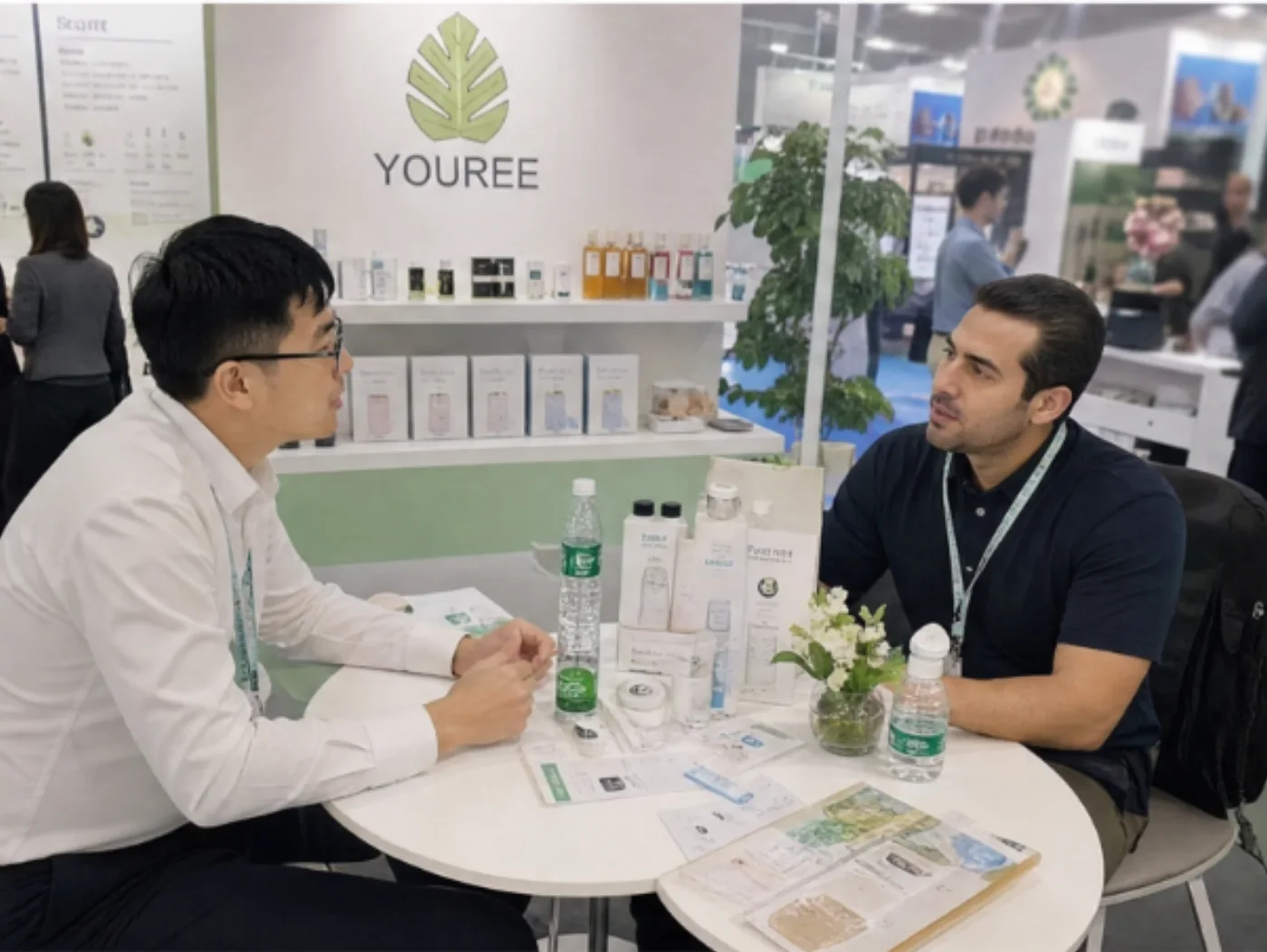 One-to-one product discussion at the YOUREE exhibition stand